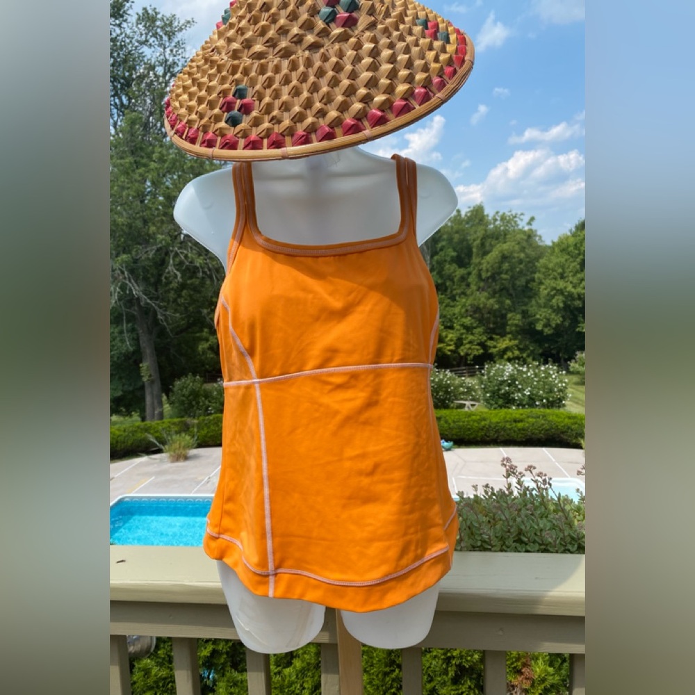 Lands End - Woman’s orange tankini with attached bra, decorative straps …